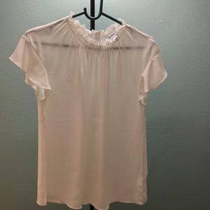 Express top is new and biege color